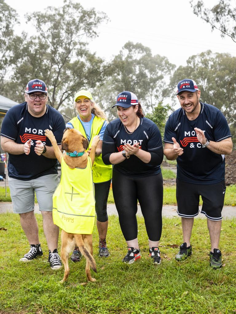 Mort and Co cheer squad (from left) Daniel Townsend, Heather Roberts of Rotary with Poppy, Tish Johnson and Doug Johnson shout encouragement to participants on the Run the Range Milne Bay Challenge 2022 in Jubilee and Redwood Parks, Sunday, May 22, 2022. Picture: Kevin Farmer