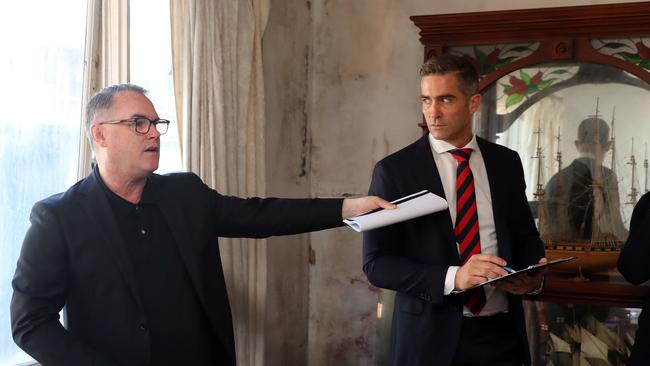 John McGrath (left) calls an auction in Sydney in October, 2022. Picture: David Swift