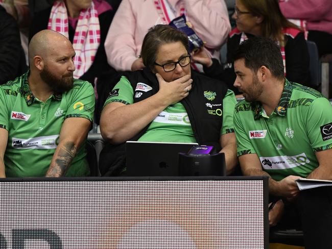 Dan Ryan confers with his assistants on Saturday. Picture: Sue McKay/Getty Images