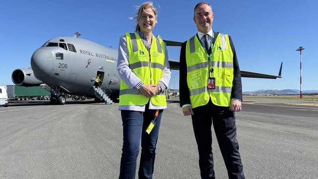 Federal Member for Franklin Julie Collins and Hobart Airport CEO Norris Carter in front of a Royal Australian Air Force Boeing C-17A Globemaster III. Picture: Simon McGuire.