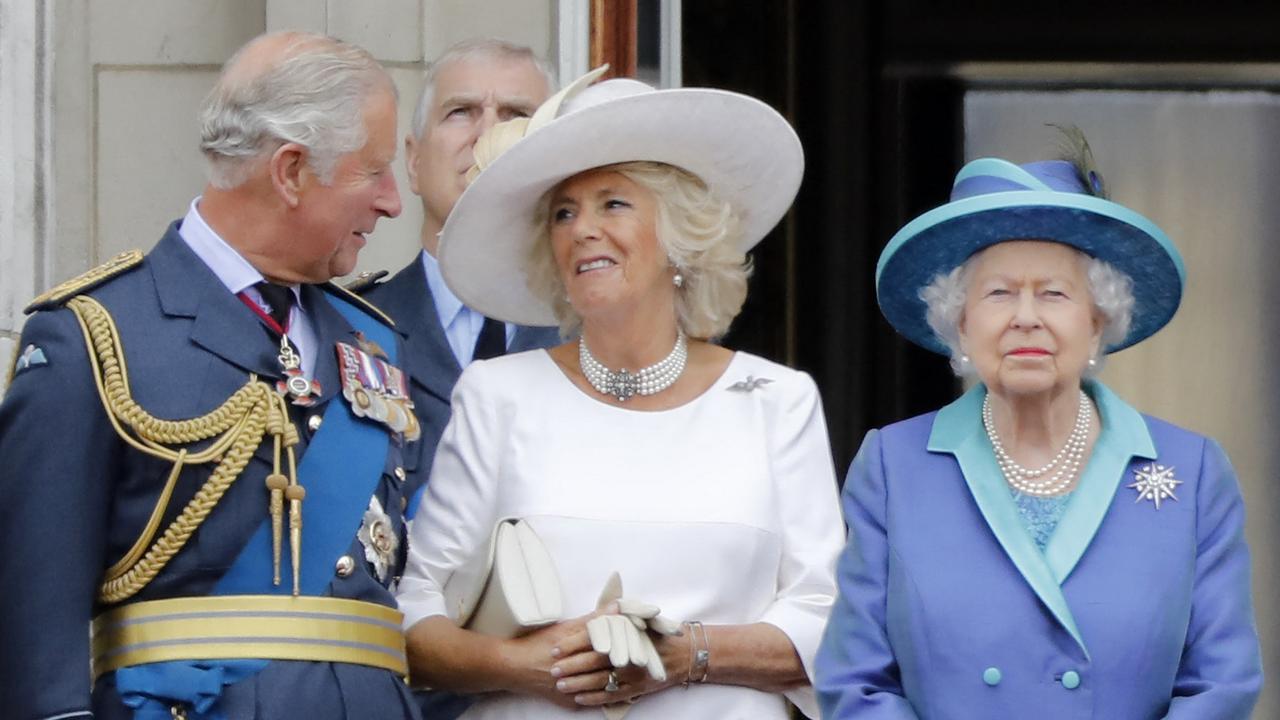 Britain's Queen Elizabeth II (R) willspend Christmas with Prince Charles, Prince of Wales (L) and Britain's Camilla, Duchess of Cornwall (C).