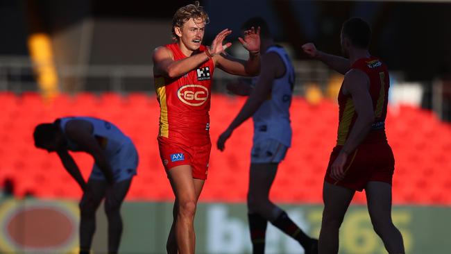 Hugh Greenwood of the Suns celebrates a goal during the round 3 AFL match between the Gold Coast Suns and the Adelaide Crows at Metricon Stadium on June 21, 2020 in Gold Coast, Australia. (Photo by Chris Hyde/Getty Images)