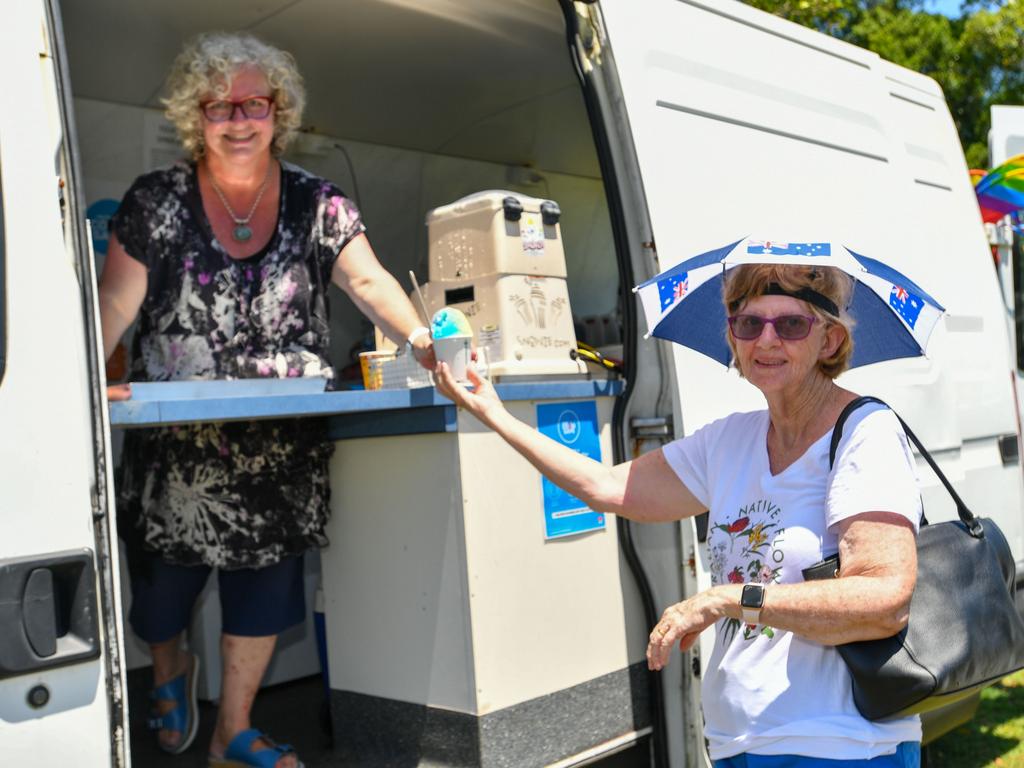 Australia Day celebrations at the Lismore City Bowlo where Lexie Collins receives a much-needed snow cone from Katrina Hume from Wondersnow in Lismore.