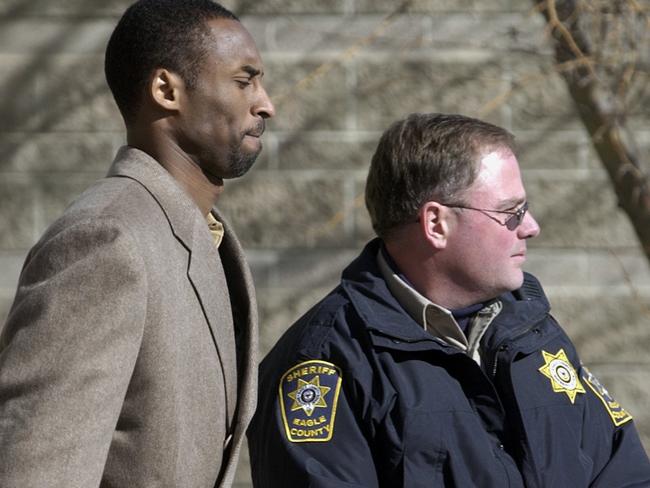 Kobe Bryant leaves court during his civil hearing in 2003.