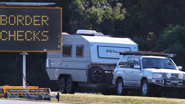 Warnings signs greet motorists at the border between Qld and NSW at Tweed Heads. Picture Glenn Hampson