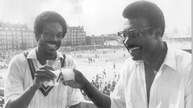 Michael Holding, left, with his captain Clive Lloyd after a win at The Oval in 1976.