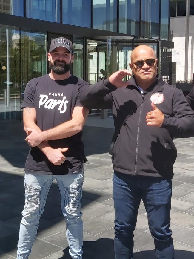 Comancheros Canberra president Pitasoni Ulavalu (right) outside the ACT Magistrates Court with gang nominee Jaymie Turner (left) on a previous occasion.