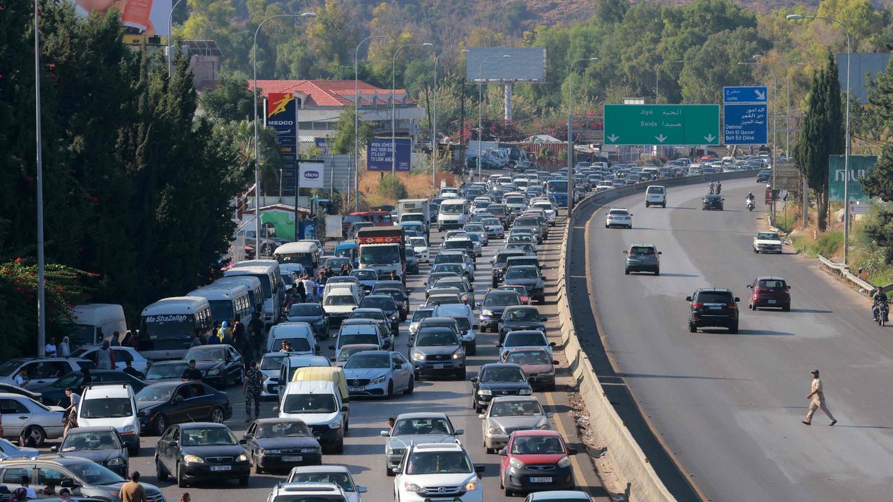 Vehicles wait in traffic in the town of Damour, south of Lebanon’s capital of Beirut on Tuesday. Picture: Ibrahim Amro/ AFP