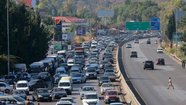 Vehicles wait in traffic in the town of Damour, south of Lebanon’s capital of Beirut on Tuesday. Picture: Ibrahim Amro/ AFP