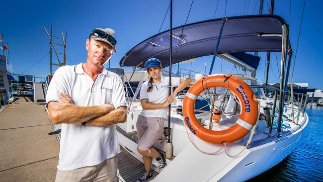 Upset Mariners Cove marina tourism operators, who are being kicked out to make way for a new superyacht marina. Michael Tromp and Samara Ey Escobar from Champagne Sailing Cruises. Picture: NIGEL HALLETT