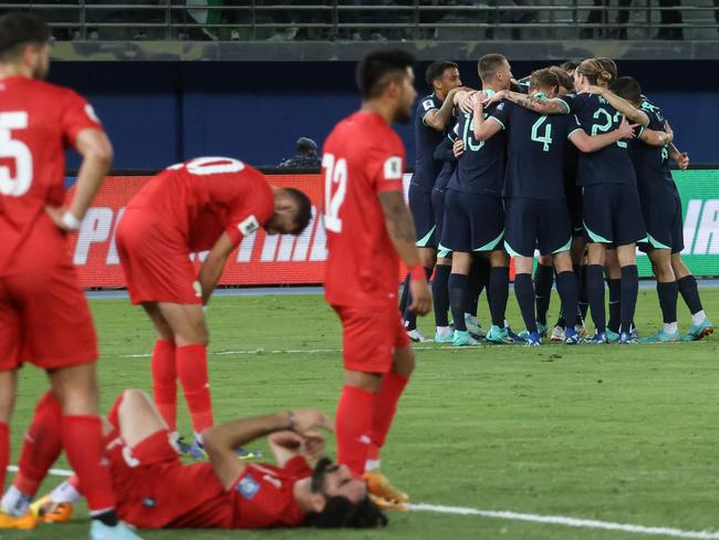 Australian players celebrate after Souttar’s goal. (Photo by Yasser Al-Zayyat / AFP)