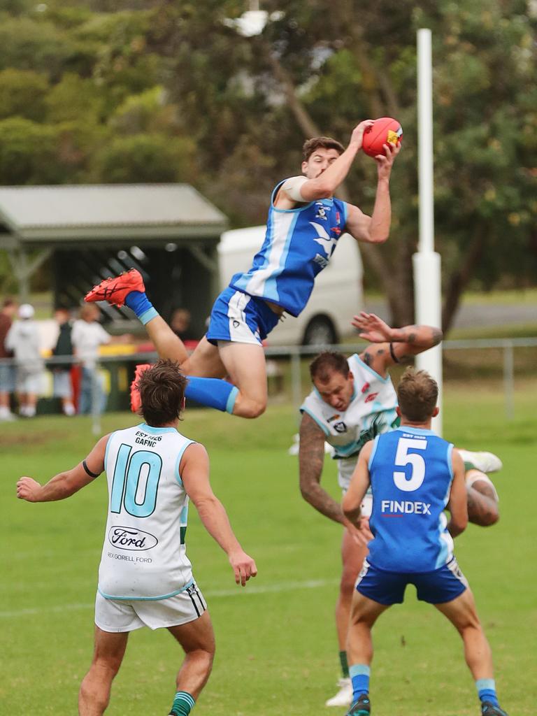 Barwon Heads’ Luke Davis takes an absolute hanger against Geelong Amateur. Picture: Alan Barber