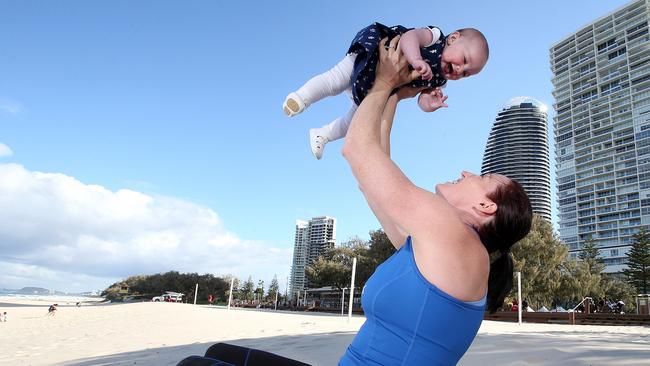 Jana Pittman is smitten with the newest edition to the family, daughter Emily. Photo: Richard Gosling