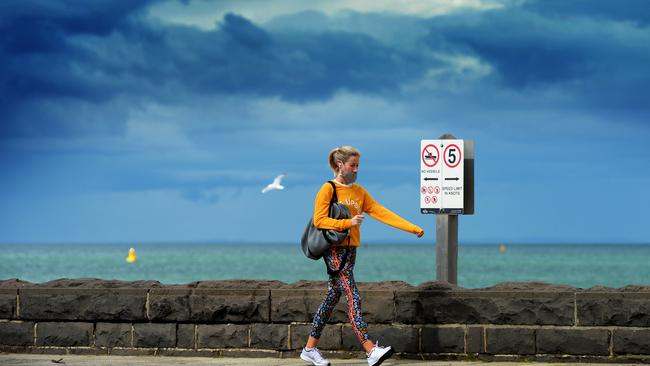 Storm clouds loom over Port Phillip Bay in Melbourne. Picture: Andrew Henshaw