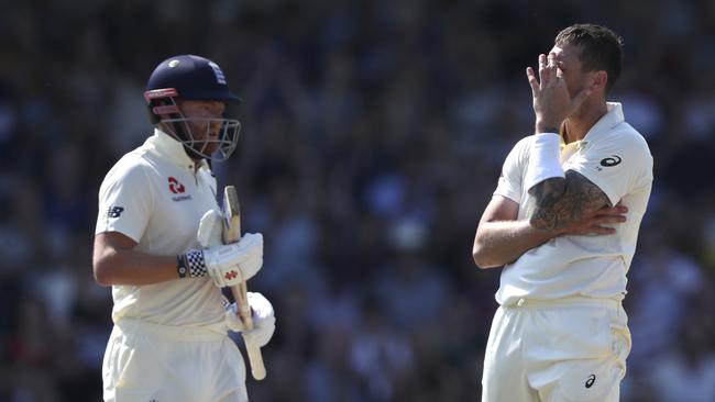 Australian paceman James Pattinson, right, reacts as England’s Jonny Bairstow gets amongst the runs at Headingley. Picture: AP