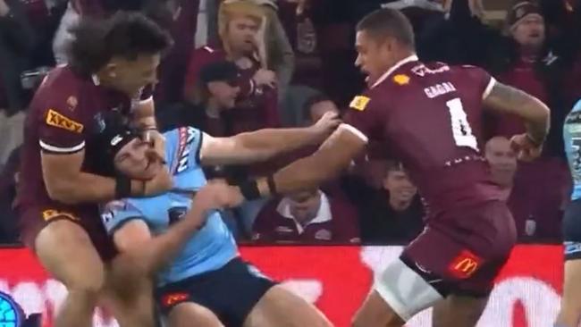 The Titans say skipper Tino Fa’asuamaleaui was trying to defuse the situation when he put Matt Burton in a headlock. Source: Channel 9