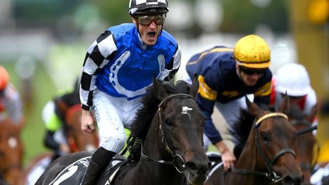 Jockey Mark Zahra is filled with emotion after crossing the finish line at the 2022 Melbourne Cup with his stallion Gold Trip. Picture: Quinn Rooney/Getty Images