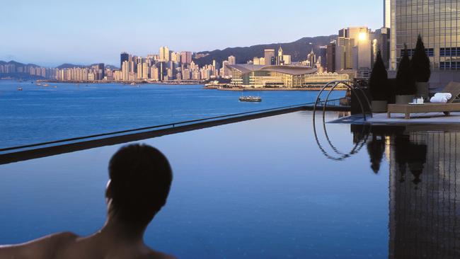 The pool looking out over Victoria Harbour at the Four Seasons in Hong Kong