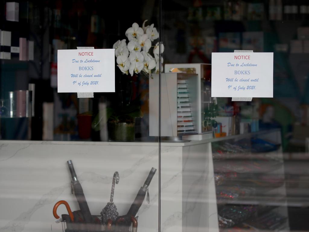 Closed signs in the windows of a store in The Rocks. Picture: Toby Zerna