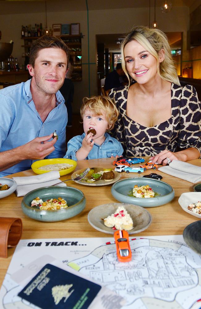 AFL player Marc Murphy and his wife Jessie like to introduce their son to the food they like to eat. Picture: Nicki Connolly