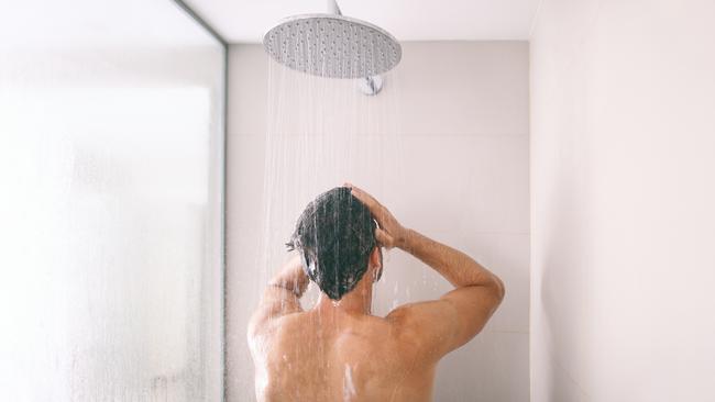 Man taking a shower generic