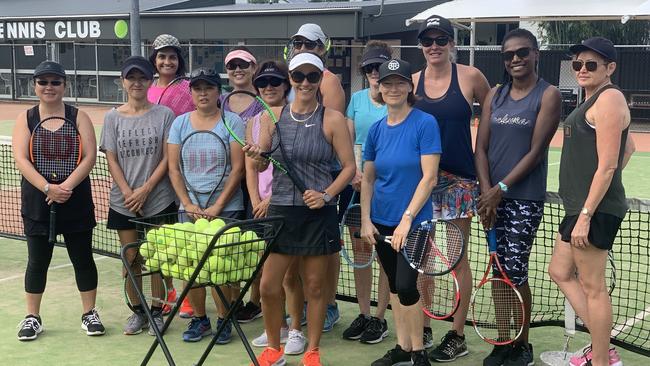 Edge Hill Tennis Club coach Georgina Sesto (centre) with a ladies' learn-to-play tennis class.