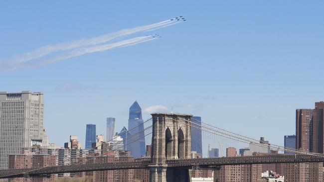 The Navy's Blue Angels and the Air Force's Thunderbirds conduct a collaborative salute to honour those battling the COVID-19 pandemic with a flyover above New York and New Jersey.