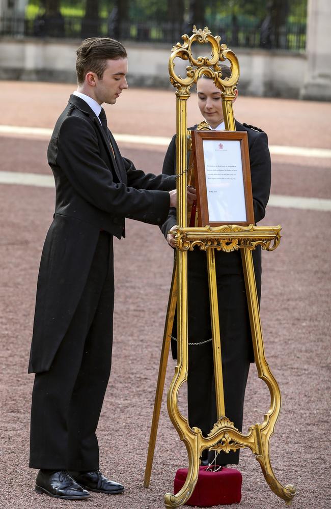 A royal birth notice is set on an easel in the forecourt of Buckingham Palace in London to formally announce the arrival of Prince Harry and Meghan’s baby boy. Picture: AP Photo/Vudi Xhymshiti 