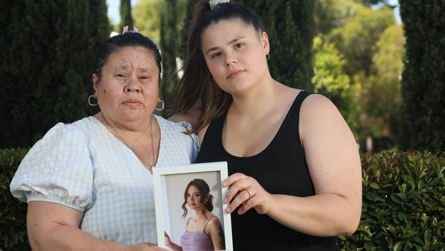 ADELAIDE, SOUTH AUSTRALIA - Advertiser Photos DECEMBER 16, 2024: Rachael Maxwell holding a picture of her daughter 25-year-old Odetta Maxwell who was killed in a car  crash in 2023 with her daughter Isobel Vlahiotis. Picture: Emma Brasier