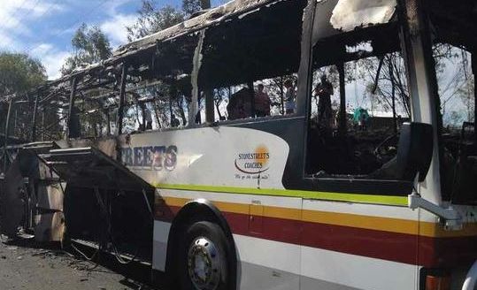 Up to 20 passengers were evacuated from this bus when it burst into flames on the Warrego Hwy near Helidon.