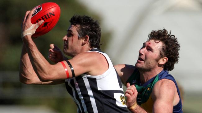 Jordan Barham takes a mark in the SANFL.