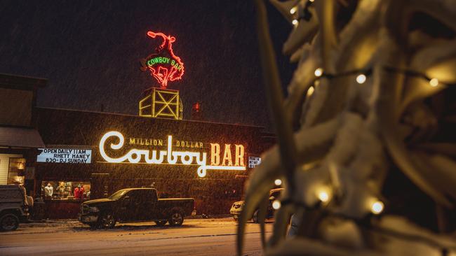 Down in Jackson, we get a mandatory drink at the Million Dollar Cowboy Bar where we take a seat in a saddle at the bar.