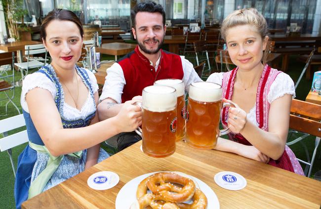 Giulia Treuner, Jeremy Lou Vaggers and Georgie Meredith celebrating Oktoberfest. Picture: Jordan Shields