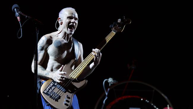 Flea rocking out during the Chili Peppers show at Accor Stadium on February 2. Picture: Jonathan Ng