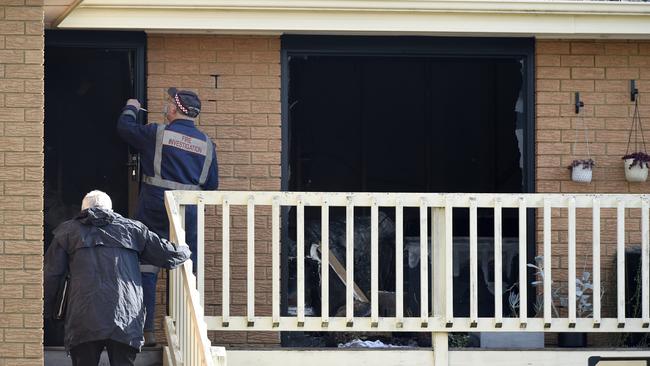 Fire investigators at the scene of a fatal fire on Maralee Drive, Mooroolbark. Picture: Andrew Henshaw