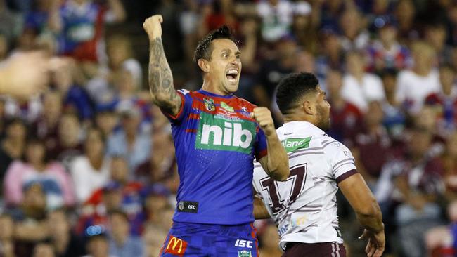 Mitchell Pearce celebrates kicking the winning field goal for Newcastle.