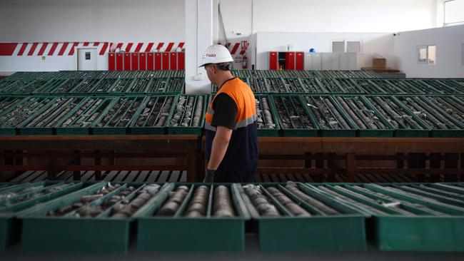 A Rio Tinto employee among sample trays of jadarite, containing lithium and borate, at the Rio Tinto Group research centre in Loznica, Serbia. Picture: Bloomberg