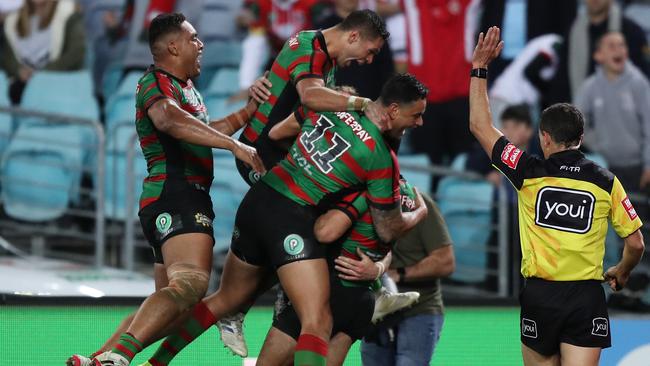 The Rabbitohs celebrate Campbell Graham’s match winner. Picture: Brett Costello