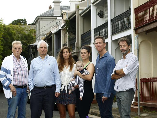 L to R: Richard Lile, Tim Brooker, Rosalie Brooker, Stacey Keating with Charlie Keting – 6 months, Rodney Hanratty, Judith White and Guy Luscombe in Thompson street. Picture: John Appleyard