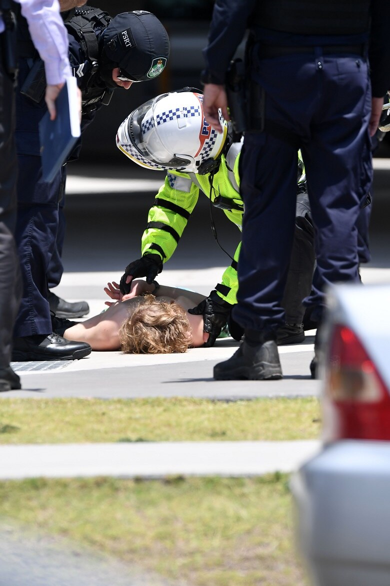 Police arrest a man after a large search in Caloundra.