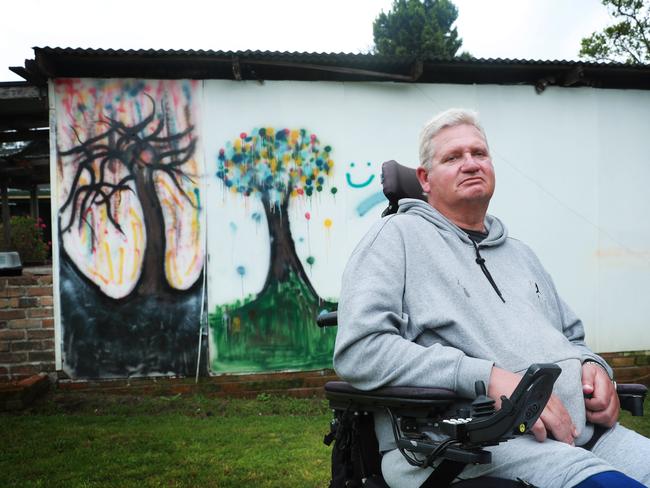 John Van de Putte at his home in Tahmoor with a mural painted by his daughter Lily before she died in the crash. Picture:. John Feder/The Australian.