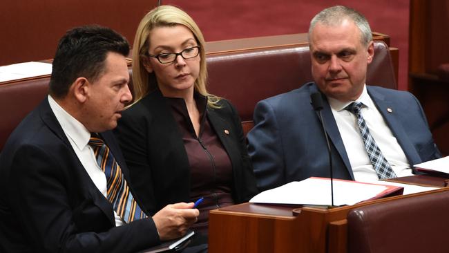 ‘If there’s a dispute you should be able to have it resolved expeditiously, cost-effectively and fairly’: Nick Xenophon in the Senate with team members Skye Kakoschke-Moore and Sterling Griff,