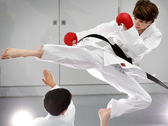 Sports Star Xander Byrne, 11, from Mont Albert North has recently won two karate championships, and is now aiming to compete for Victoria in the National Titles later this year. Xander training at Healthways Recreation Centre in Mont Albert North with Sidney Heng. Picture: Steve Tanner