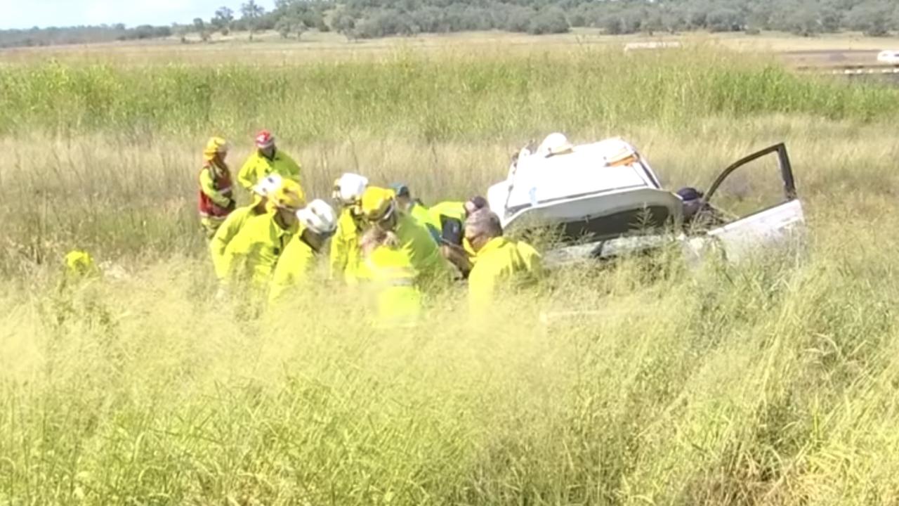 A young woman and a toddler have escaped major injury after their vehicle rolled into a ditch off the Warrego Highway. Photo: 7 News