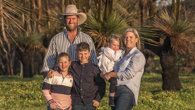 Kangaroo Island bushfire survivors Tom and Stephanie Wurst with children Georgia, Jack and toddler Charlotte on their family farm. Picture: Sean McGowan