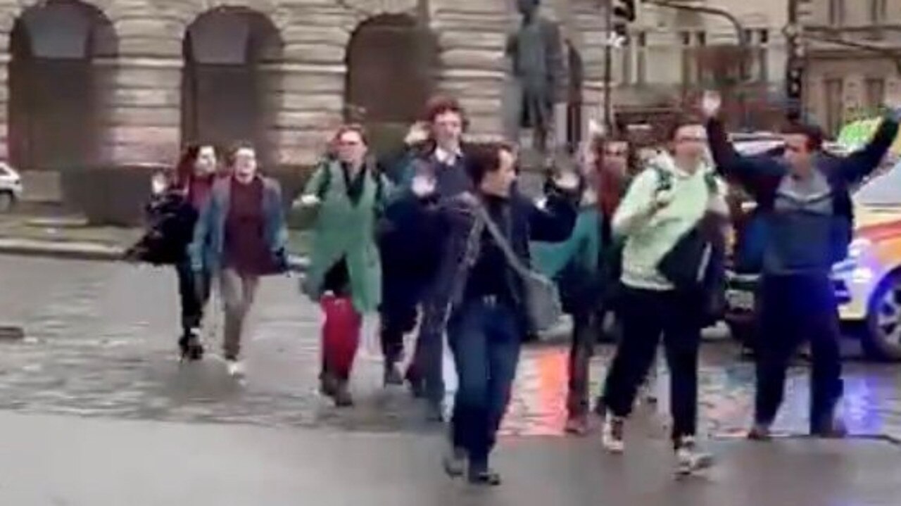 A US tourist captured the moment Prague shooter David Kozak opened fire, killing 14 at the university. Picture: X