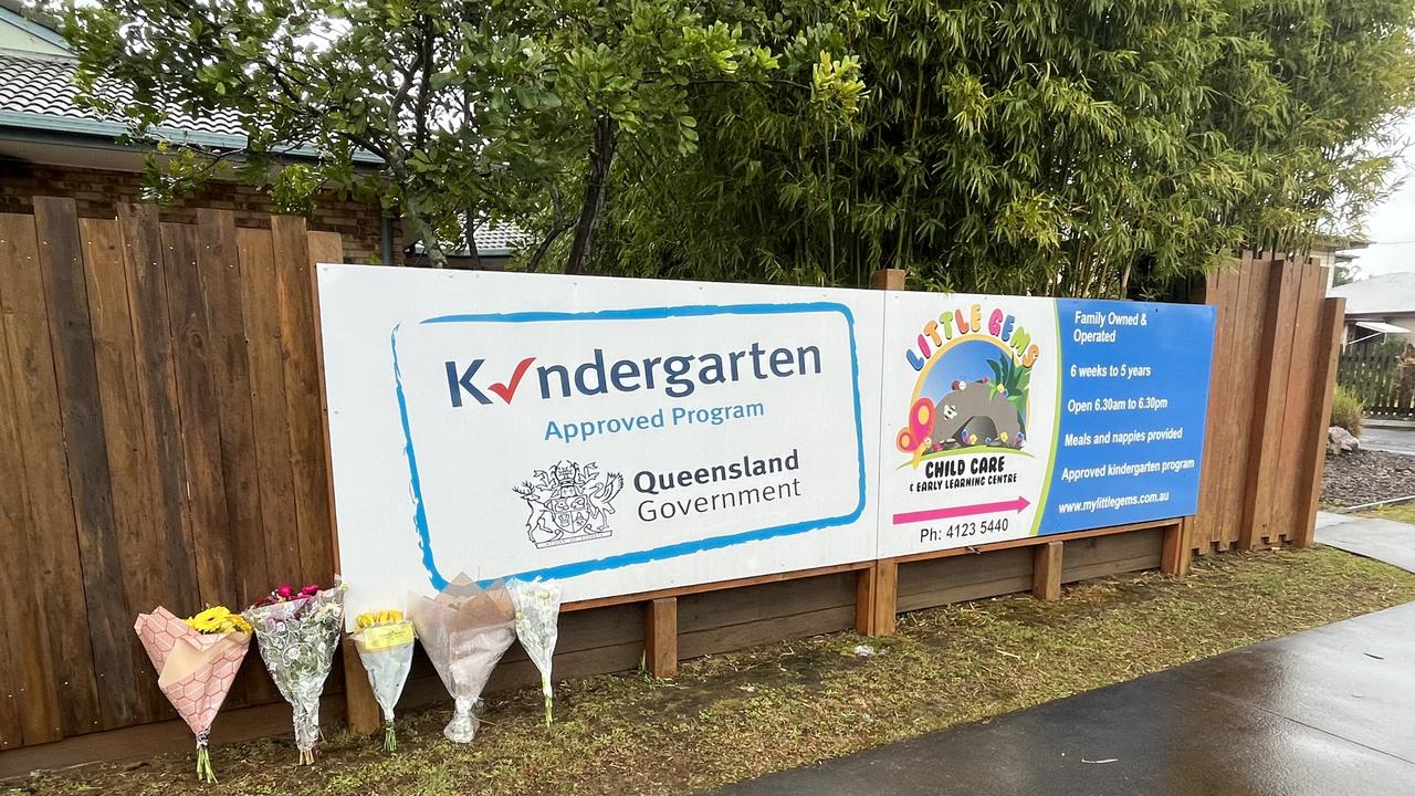 Floral tributes left outside Maryborough’s Little Gems Childcare and Early Learning Centre after the death of a two-year-old boy there on Wednesday, July 20, 2022.