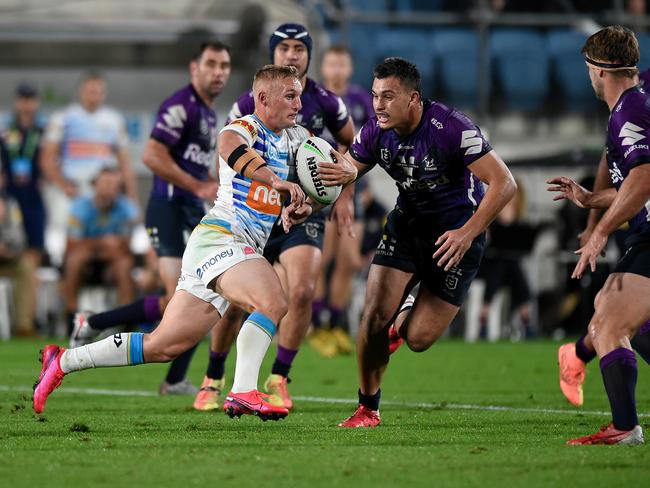 Tanah Boyd of the Titans runs with the ball during the round 10 NRL match between the Melbourne Storm and the Gold Coast Titans at Sunshine Coast Stadium on July 17, 2020 in Sunshine Coast, Australia. (Photo by Matt Roberts/Getty Images)