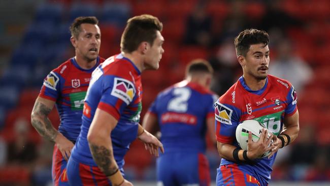 NEWCASTLE, AUSTRALIA – SEPTEMBER 04: Enari Tuala of the Newcastle Knights runs the ball during the round 17 NRL match between the Newcastle Knights and the Cronulla Sharks at McDonald Jones Stadium on September 04, 2020 in Newcastle, Australia. (Photo by Ashley Feder/Getty Images)