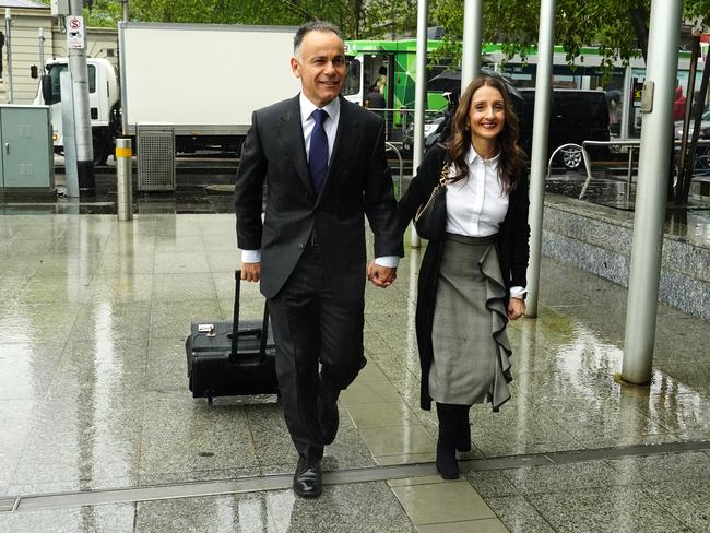 John Pesutto arrives at court with his wife Betty. Picture: Luis Enrique Ascui